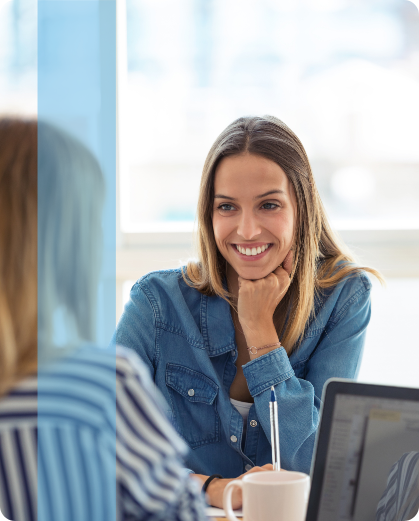 Two professionals in an interview meeting, representing Konnekt's teams.