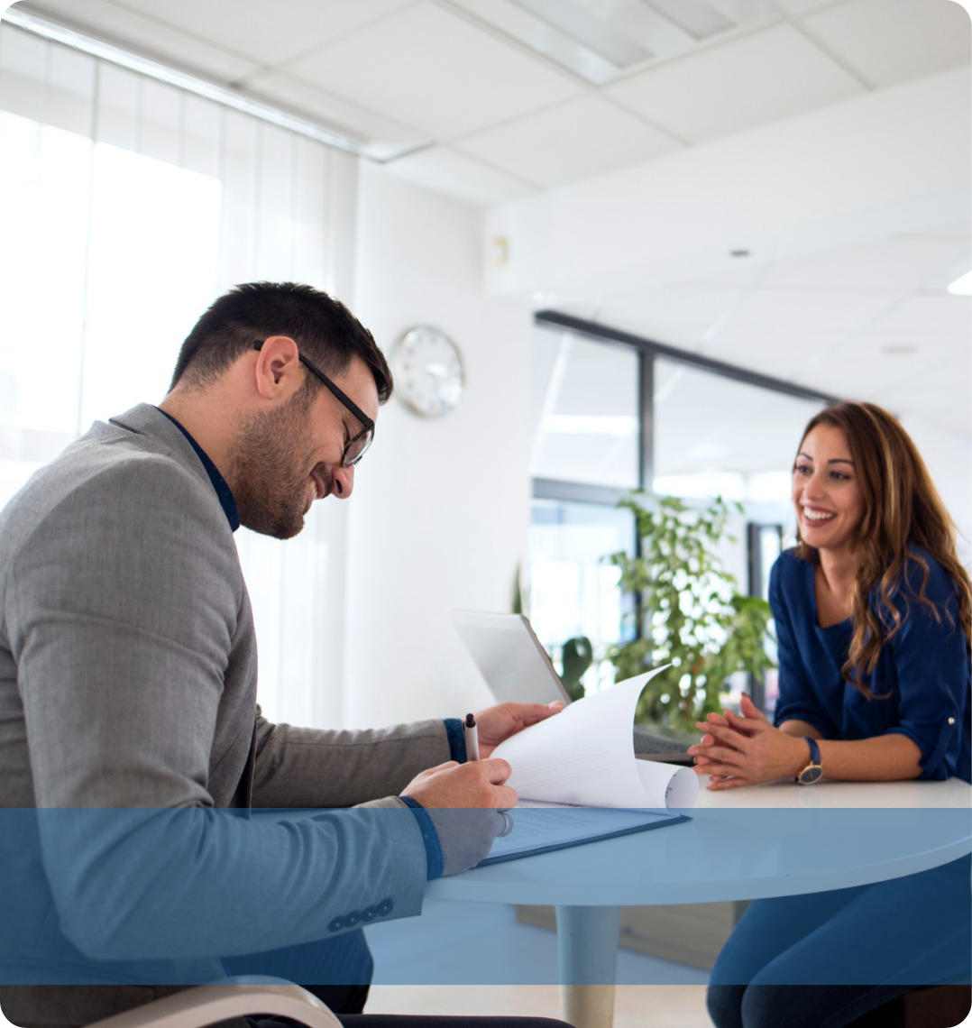 A recruiter interacting with a colleague representing the Konnekt Skilled & Operational recruitment team.