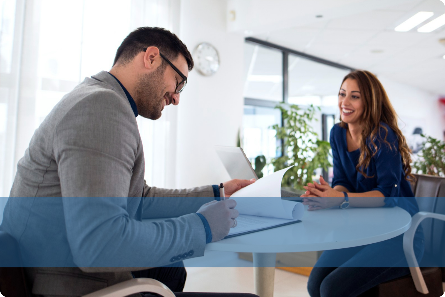A recruiter interacting with a colleague representing the Konnekt Skilled & Operational recruitment team.